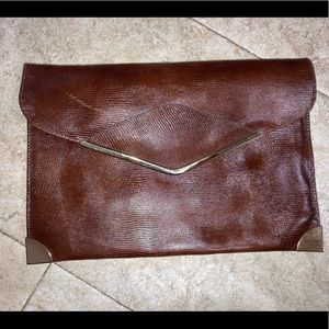 Vintage brown envelope Phillippe clutch.